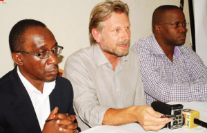 Peter Wandera of Transparency International, Lars Tallert the project leader and James Kigozi of UMDF at the press conference