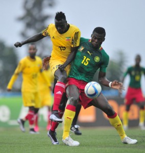 Tafesse Shewamene of Ethiopia tackled by Frank Thierry Boya of Cameroon during the 2016 CHAN Rwanda. ©Muzi Ntombela/BackpagePix
