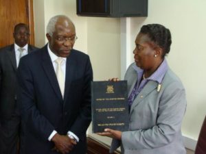 Speaker of Parliament Rebecca Kadaga recieving the Auditor General John Muwanga's report previously.