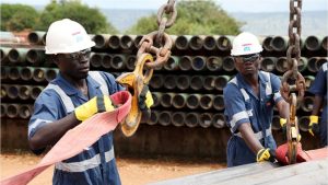 workers at oil and gas refinery oroject