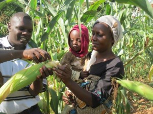 Group members admire their maize