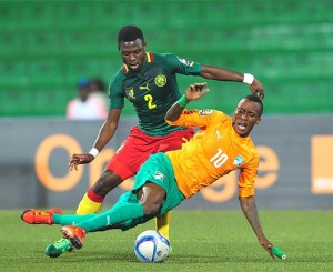 Krahire Yannick Zakri of Ivory Coast is fouled by Joseph Ngwem of Cameroon ©Ryan Wilkisky/BackpagePix